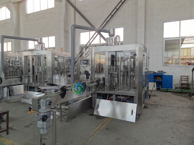 12 Pcs Heads Water Bottle Filling Machine Full Automatic CSD Filling Equipment